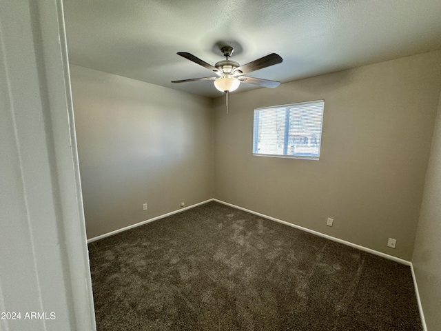 3637 W Myrtle Ave, Phoenix, AZ 85051 - unfurnished room with dark carpet, ceiling fan, and baseboards