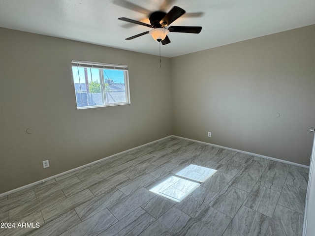 empty room with ceiling fan