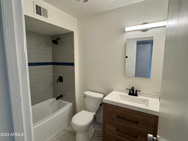 3637 W Myrtle Ave, Phoenix, AZ 85051 - full bathroom with toilet, vanity, and shower / washtub combination