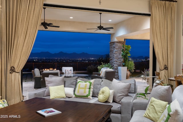 6102 E Sage Dr, Paradise Valley, AZ 85253 - living room with a ceiling fan, a mountain view, and recessed lighting