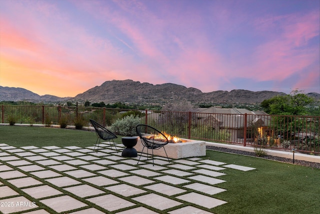 6102 E Sage Dr, Paradise Valley, AZ 85253 - view of yard with an outdoor fire pit, a mountain view, and a patio area