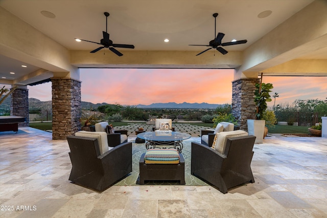 6102 E Sage Dr, Paradise Valley, AZ 85253 - view of patio featuring ceiling fan, an outdoor living space, and a mountain view