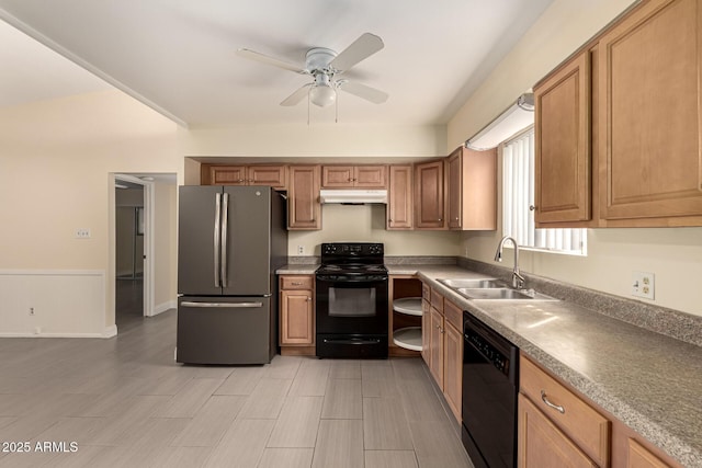 kitchen with under cabinet range hood, a sink, a ceiling fan, black appliances, and brown cabinetry