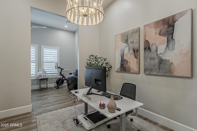 home office featuring visible vents, wood finished floors, baseboards, recessed lighting, and a notable chandelier