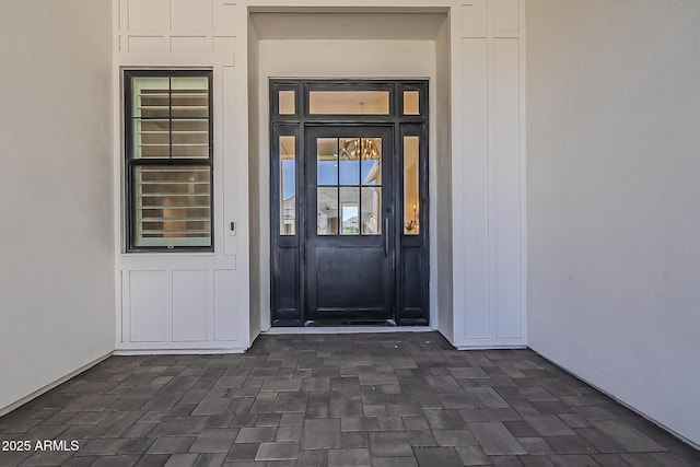 doorway to property with board and batten siding