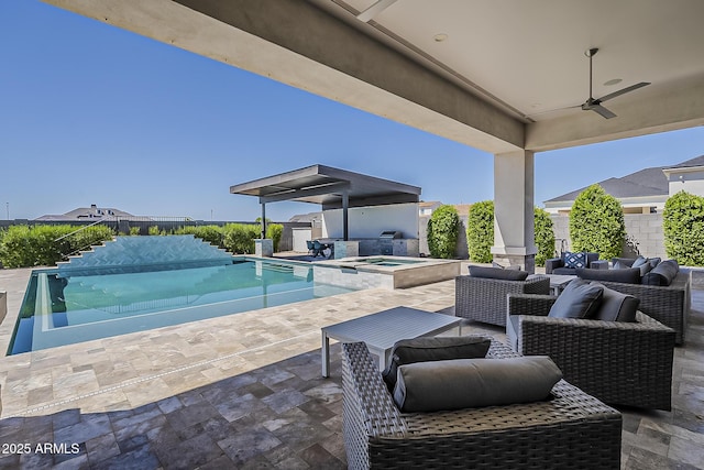 view of swimming pool with an outdoor living space, ceiling fan, a patio area, and a pool with connected hot tub