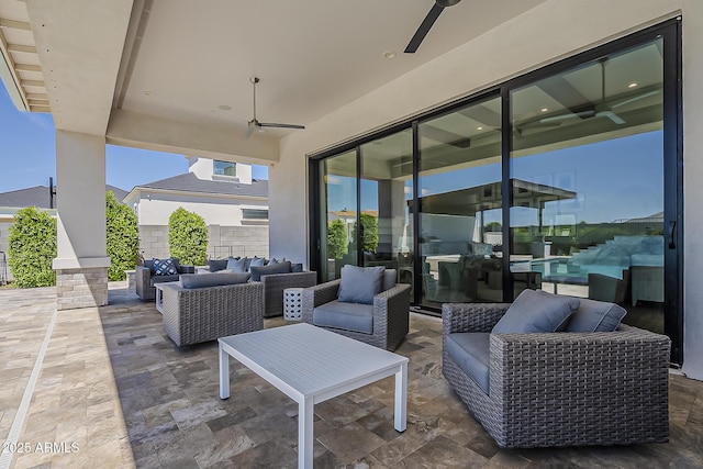 view of patio featuring outdoor lounge area and a ceiling fan