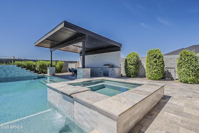 view of pool with area for grilling, an in ground hot tub, a fenced backyard, and a patio area