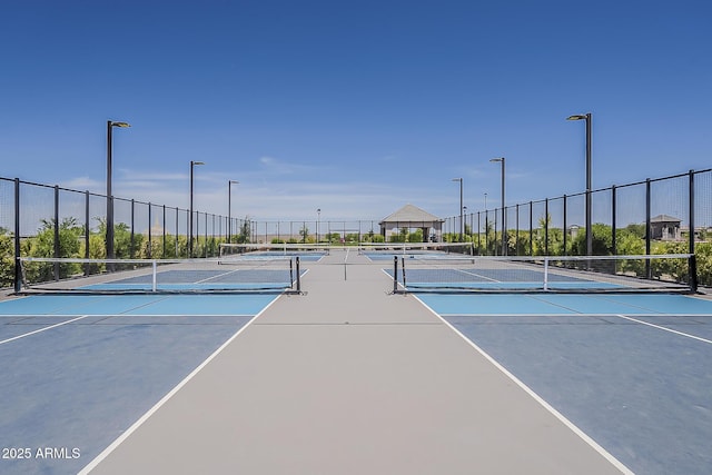 view of sport court with community basketball court and fence