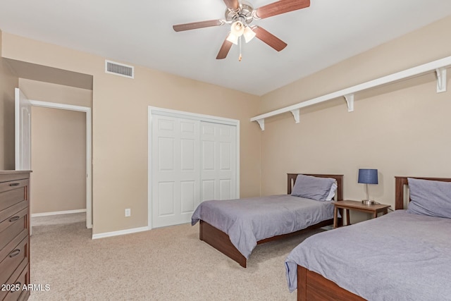 3514 E Desert Willow Rd, Phoenix, AZ 85044 - bedroom featuring a closet, light colored carpet, baseboards, and ceiling fan