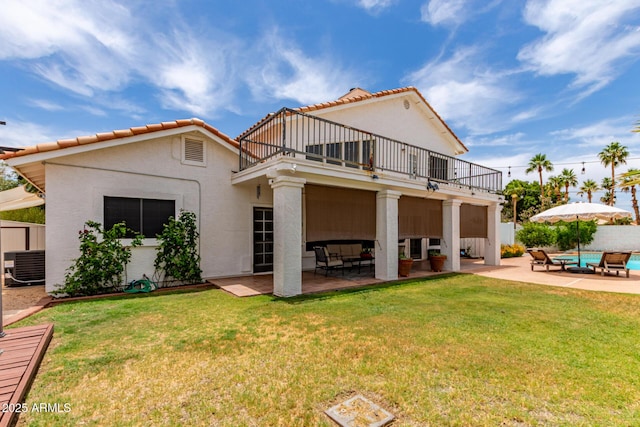 3514 E Desert Willow Rd, Phoenix, AZ 85044 - rear view of house featuring a balcony, a patio area, central AC unit, and stucco siding