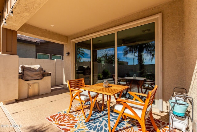 view of patio featuring an outdoor kitchen