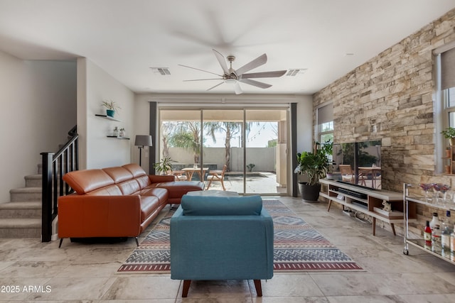 living room featuring ceiling fan