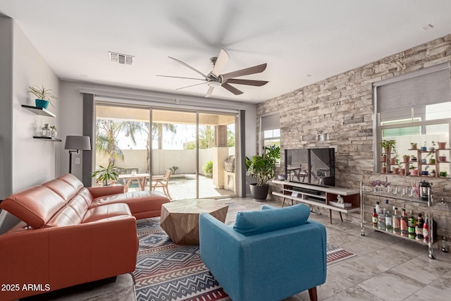 living room with ceiling fan