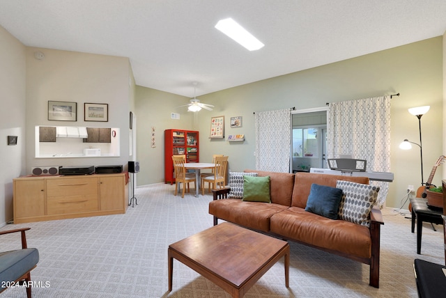 carpeted living room featuring ceiling fan