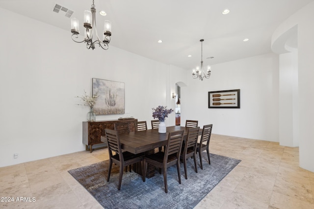 dining space featuring a chandelier