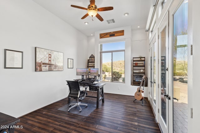 office with ceiling fan, dark hardwood / wood-style flooring, and french doors