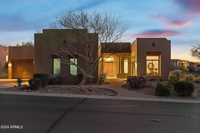 adobe home with a garage