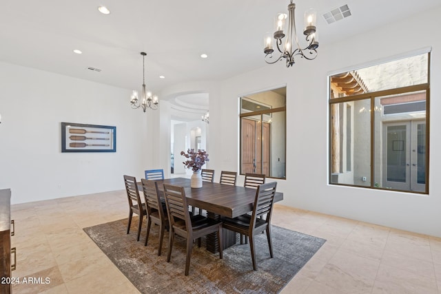 dining room featuring a chandelier