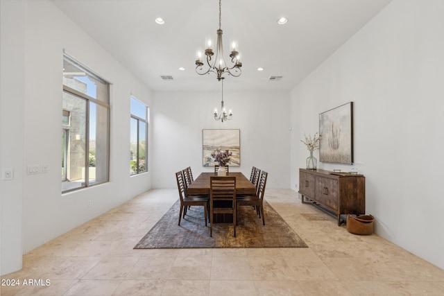 dining area with a notable chandelier