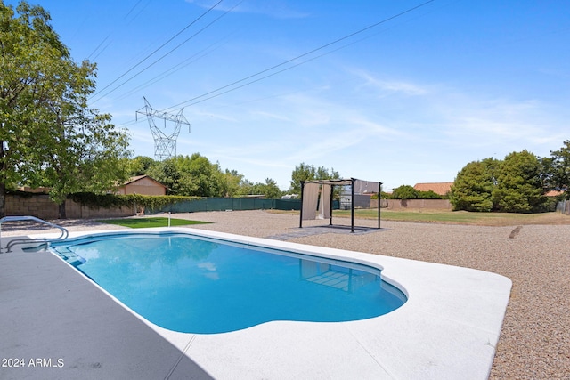 view of pool featuring a patio