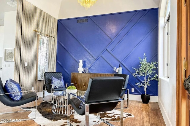 sitting room featuring hardwood / wood-style flooring