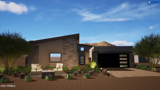 12328 E Black Rock Rd, Scottsdale, AZ 85255 - modern home with an attached garage, stucco siding, stone siding, and decorative driveway