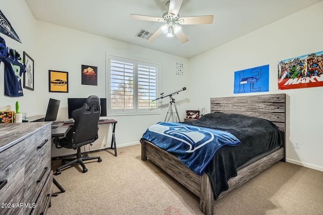 bedroom with ceiling fan and carpet floors