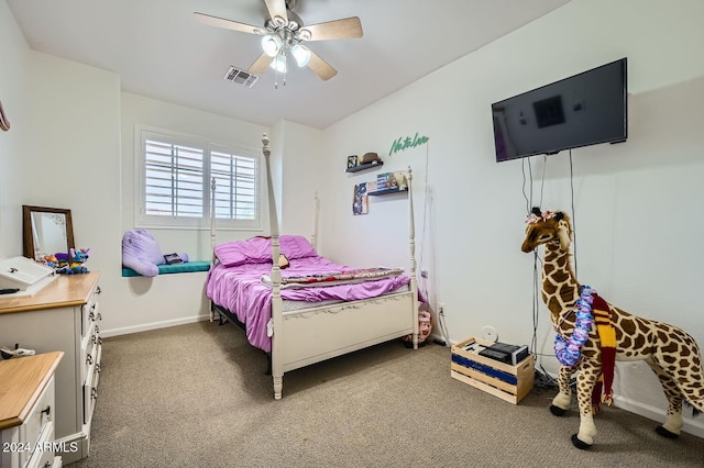 bedroom with dark carpet and ceiling fan