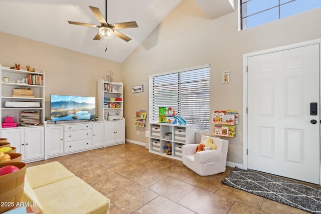 1344 N Brittany Ln, Gilbert, AZ 85233 - living room featuring high vaulted ceiling, a ceiling fan, light tile patterned flooring, and baseboards