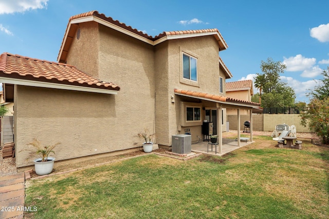 1344 N Brittany Ln, Gilbert, AZ 85233 - back of property featuring a tiled roof, a patio area, cooling unit, and stucco siding