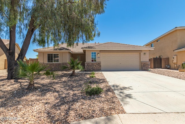 ranch-style home with a garage