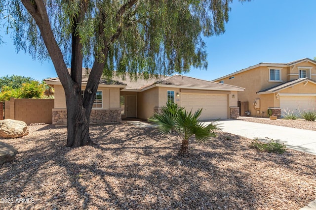 ranch-style home with a garage