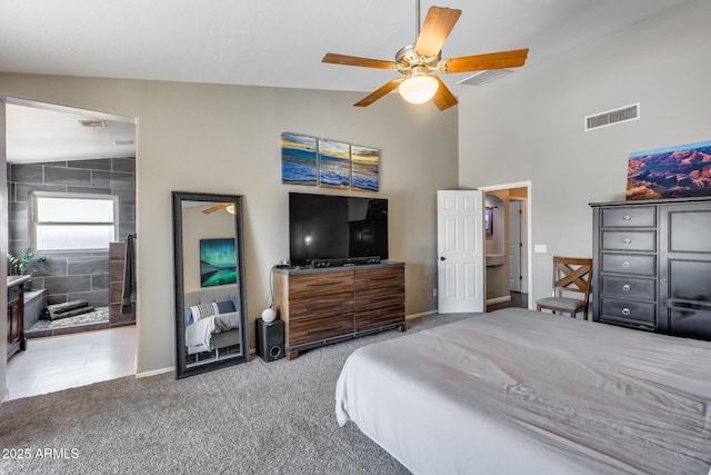 carpeted bedroom featuring visible vents, baseboards, high vaulted ceiling, and ceiling fan