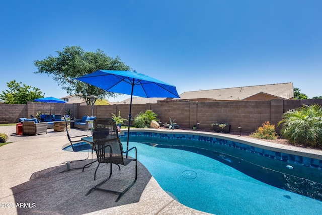 view of swimming pool with a fenced in pool, a patio, outdoor lounge area, and a fenced backyard