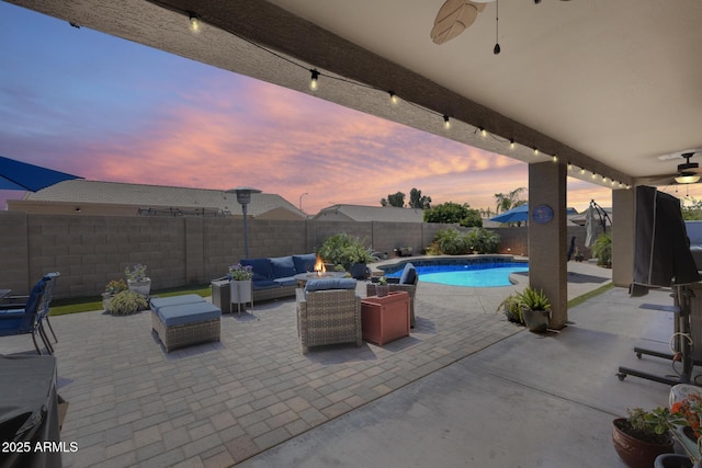 view of patio / terrace featuring a fenced in pool, an outdoor living space, a fenced backyard, and a ceiling fan
