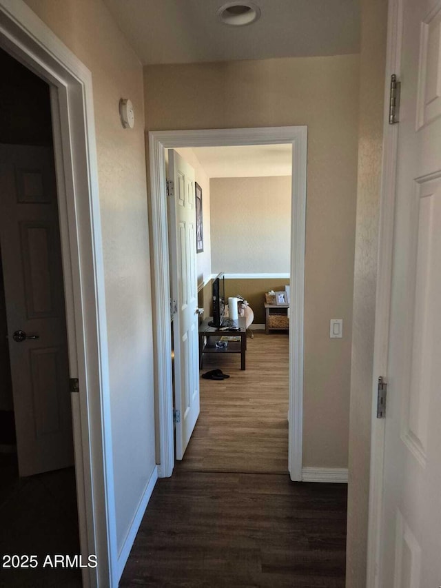 2050 W Davis Rd, Phoenix, AZ 85023 - corridor with dark wood-type flooring and baseboards