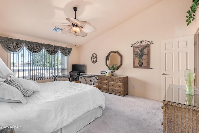 bedroom featuring vaulted ceiling, ceiling fan, and light colored carpet