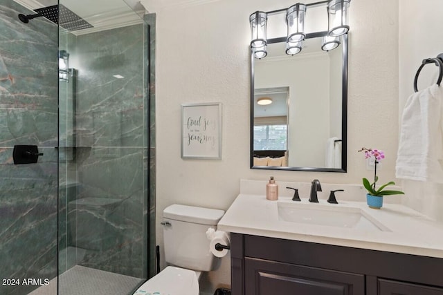 bathroom with walk in shower, crown molding, vanity, and toilet