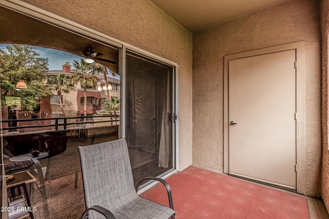 view of patio / terrace with a balcony