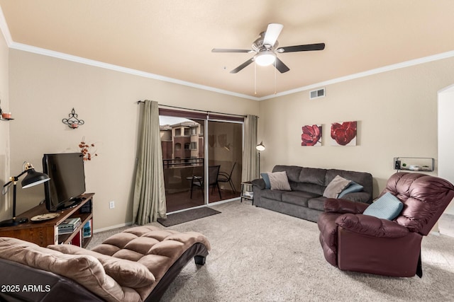 living room with carpet, visible vents, and crown molding