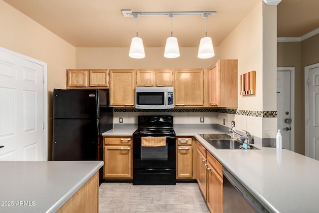 kitchen featuring light brown cabinets, black appliances, tasteful backsplash, and a sink