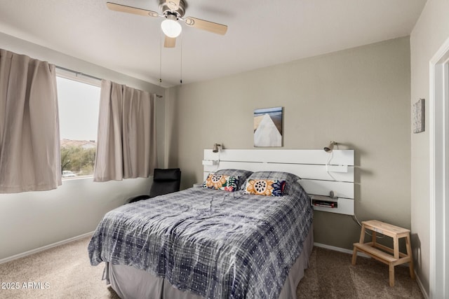 carpeted bedroom featuring a ceiling fan and baseboards