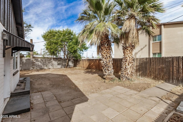 view of patio with a fenced backyard