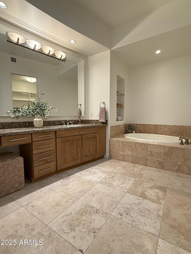 kitchen featuring pendant lighting, sink, light colored carpet, stainless steel appliances, and stone countertops