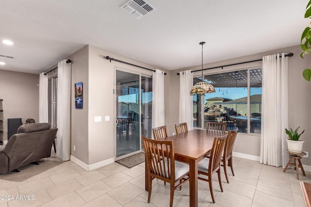 dining room with light tile patterned floors