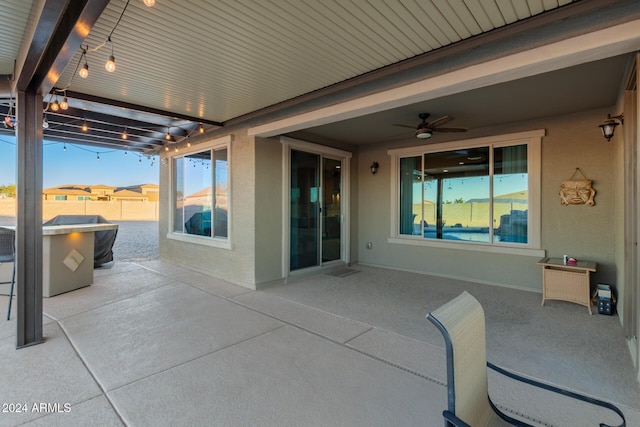 view of patio with ceiling fan