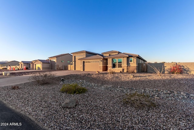 view of front of property with a garage