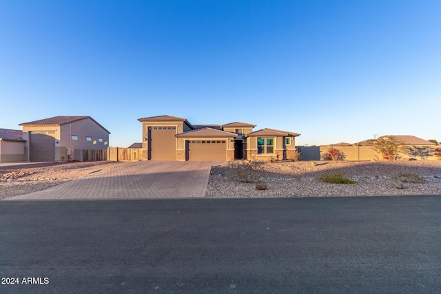 view of front of property with a garage