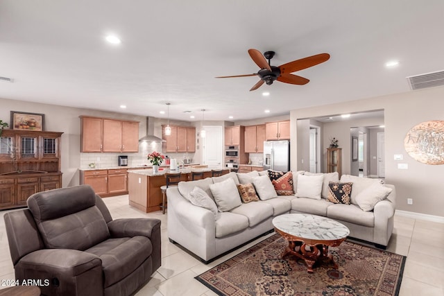 tiled living room featuring ceiling fan